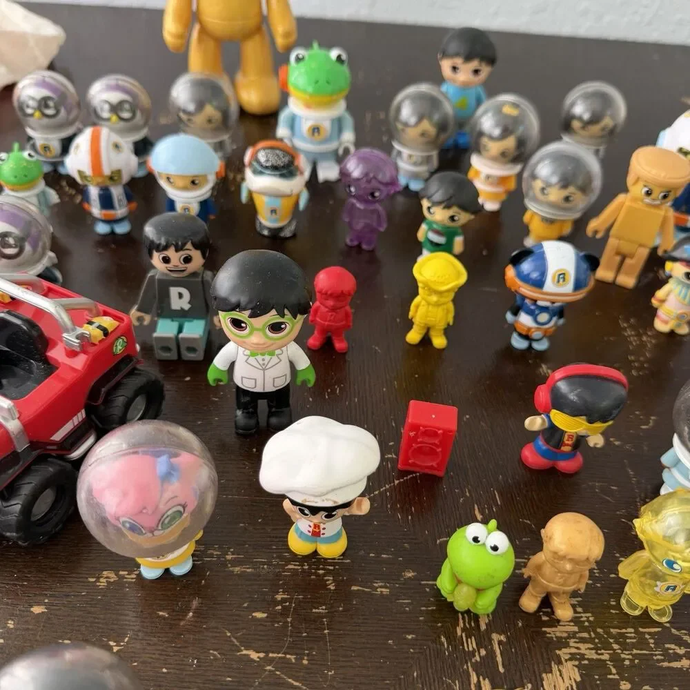 Ryan’s World Figures Lot 58 Pieces Red Titan Pandas Robots Helmet Astronauts